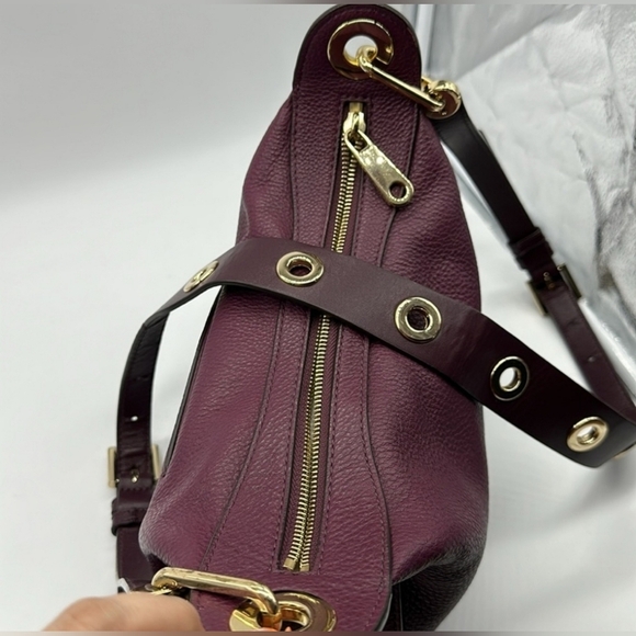 Micheal Kors Plum Pebbled Leather Grommet Strap Hobo EUC - Picture 2 of 5